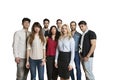 Portrait of multiethnic group of friends standing together over colored background