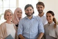 Portrait of multiethnic work team posing together in office Royalty Free Stock Photo