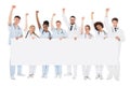 Portrait Of Multiracial Medical Team Holding Billboard Royalty Free Stock Photo