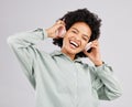 Portrait, music headphones and black woman singing in studio isolated on white background. Singer, radio and happiness Royalty Free Stock Photo