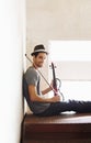 Portrait, musician and man with a violin, smile and training for a performance, sound or happiness at home. Face, male Royalty Free Stock Photo