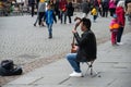 Portrait of musician playing traditional Mongolian violin in the street