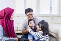 Portrait of muslim family clapping hands playfully Royalty Free Stock Photo