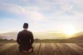 Portrait of muslim man kneeling and praying to god Royalty Free Stock Photo