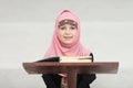 Young Muslim Girl Reading The Koran Royalty Free Stock Photo