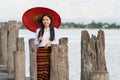 Myanmar woman at U Bein bridge at Amarapura Manndalay