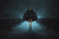 Portrait of mysterious witch with black hooded standing Royalty Free Stock Photo