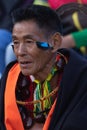 Portrait of a Naga tribesman wearing traditional attire