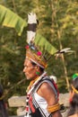 Portrait of a Naga tribseman dressed in traditional attire at Kohima Nagaland India