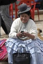 Portrait Native American woman with cell phone