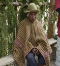 Portrait of a Native Peruvian man wearing typical andean robe