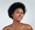 Portrait, natural hair and black woman with glow in skincare or cosmetic on white background in studio. Beauty, face and Royalty Free Stock Photo