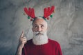 Portrait of negative minded stylish old man wear deer headband point index finger dislike x-mas christmas party costume