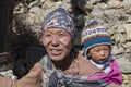 Portrait nepalese mother and child on the street in Himalayan village, Nepal