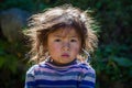 Portrait nepali child on the street in Himalayan village, Nepal
