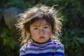 Portrait nepali child on the street in Himalayan village, Nepal