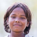 Portrait nepali child on the street in Himalayan village, Nepal