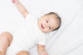 Portrait of a newborn Asian baby on the bed Royalty Free Stock Photo