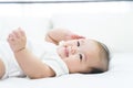 Portrait of a newborn Asian baby on the bed Royalty Free Stock Photo