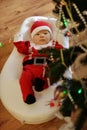 Newborn baby boy wearing Santa clothes