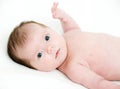 Portrait newborn baby lying in bed