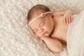 Portrait of a Newborn Girl with Lace Headband Royalty Free Stock Photo