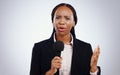 Portrait, news and broadcast with black woman, microphone and journalist on a white studio background. Face, African