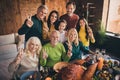 Portrait of nice attractive cheerful positive family grandparents parents grandchildren brother sister embracing showing Royalty Free Stock Photo