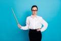 Portrait of nice attractive coacher pointing wooden stick copy space science isolated over bright blue color background Royalty Free Stock Photo