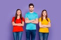 Portrait of nice attractive lovely charming calm content focused guys wearing colorful t-shirts jeans denim high school Royalty Free Stock Photo