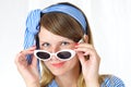 Portrait of nice blue-eyed woman with sunglasses