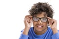 Portrait of the nice boy in glasses with blue shirt on white Royalty Free Stock Photo