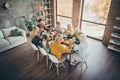 Portrait of nice calm peaceful big full family brother sister couples eating feast holding hands praying autumn fall Royalty Free Stock Photo