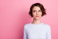 Portrait of nice charming millennial girl look copyspace wear white sweater isolated over pink color background