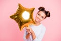 Portrait of nice cute adorable attractive lovely sweet cheerful cheery positive girl holding big large air baloon golden