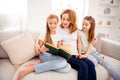 Portrait of nice cute adorable winsome lovely attractive charming cheerful cheery redhead people mom mommy mum reading Royalty Free Stock Photo