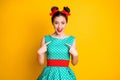 Portrait of nice lovely sweet cheerful girl wearing teal dress pointing at herself isolated over vibrant yellow color