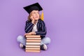 Portrait of nice smart bored schoolboy wearing hat thinking copy space isolated over purple violet color background Royalty Free Stock Photo