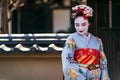 Portrait of a nice woman in a Maiko kimono dress