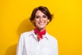 Portrait of nice young girl brown bob hair wear white shirt red kerchief glamour chic good mood model isolated on yellow