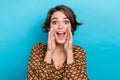 Portrait of nice young woman bob brown hair hands cheeks funny screaming future update social media app isolated on blue Royalty Free Stock Photo