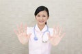 Female nurse making stop sign Royalty Free Stock Photo