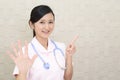 Female nurse making stop sign Royalty Free Stock Photo