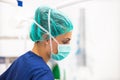 Portrait of nurse with mask in surgery room