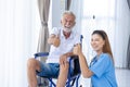 Portrait Nurse Medical Staff Support Service Senior Elderly Man Healthy on Wheel Chair thumbs up happy smile