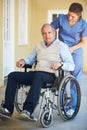 Portrait, nurse or old man in wheelchair in hospital helping an elderly patient for trust or support in clinic. Happy Royalty Free Stock Photo