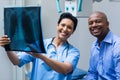 Portrait of nurse and patient discussing x-ray Royalty Free Stock Photo