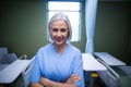 Portrait of nurse standing with arms crossed Royalty Free Stock Photo