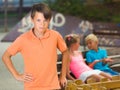 Portrait of offended boy which is standing outside of the company Royalty Free Stock Photo