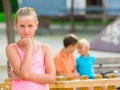 Portrait of offended girl which is standing outside of the company Royalty Free Stock Photo